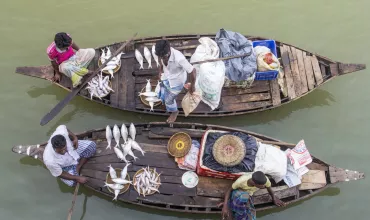 Fishers on a boat in Bangladesh