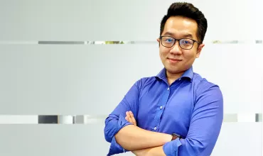 A portrait of Isaac, a Medical Lead at Novartis